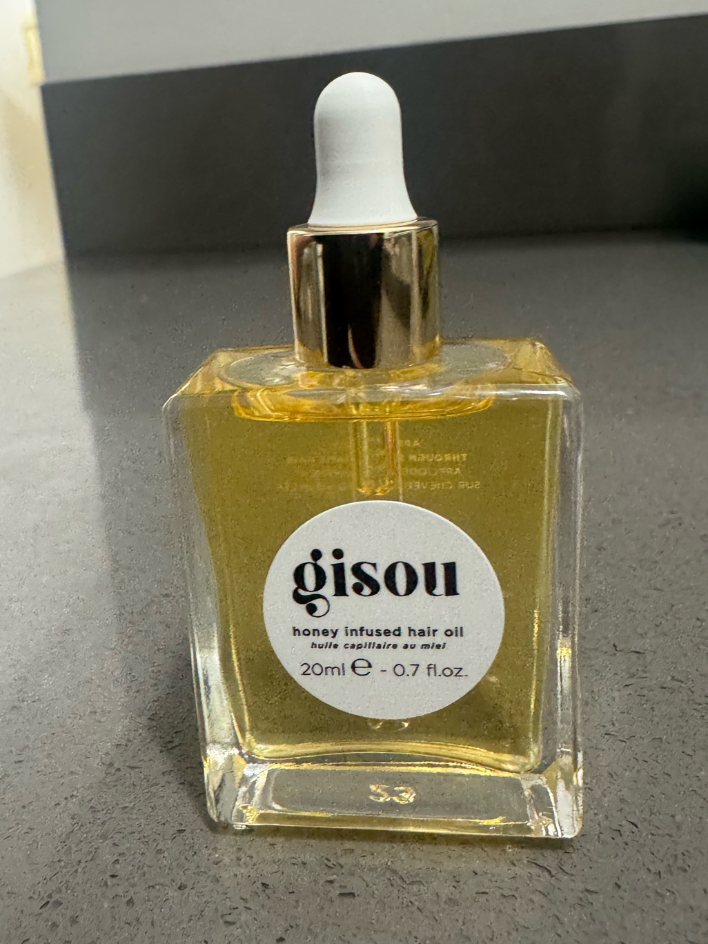 Gisou Honey Infused Hair Oil Gold Clear Bottle